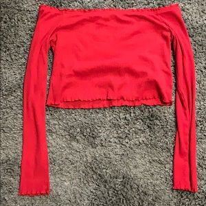 Off the shoulder red Divided top.